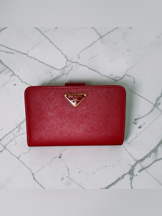 Prada Handbags - Prada Red Saffiano Compact Wallet with Gold Triangle Logo